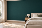 Coloris & matières — Vert foncé, revêtement mural dans une chambre apaisante.