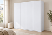Coloris & matières — Blanc, film adhésif appliqué sur une armoire.