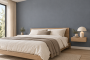 Coloris & matières — Gris foncé, revêtement mural dans une chambre paisible.