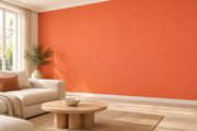 Coloris & matières — Orange, revêtement mural dans un salon lumineux.
