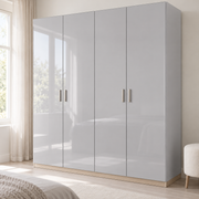 Couleurs d’atelier, gris brillant : film adhésif appliqué sur une armoire dans une pièce lumineuse.